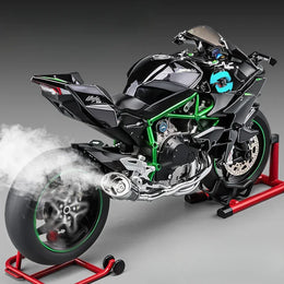 Realistic black toy motorcycle model with green frame, smoke effect, displayed on red stands, Tafeen Toys